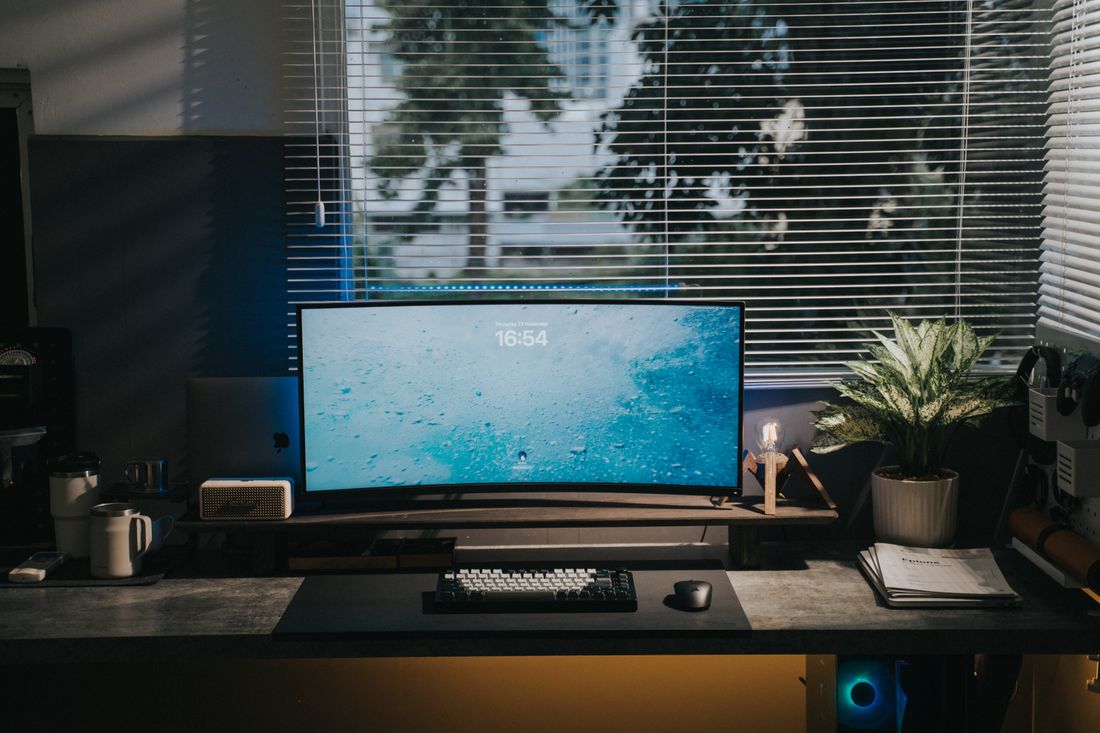 A workspace with window blinds
