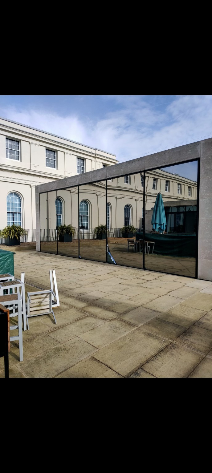 Reflective glazing on an external facade
