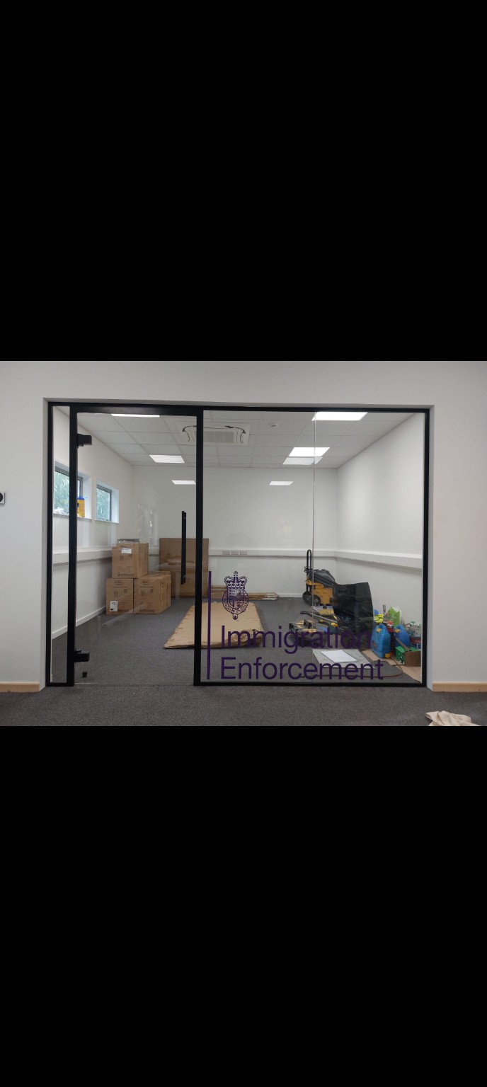 Cut vinyl lettering on a glazed office room