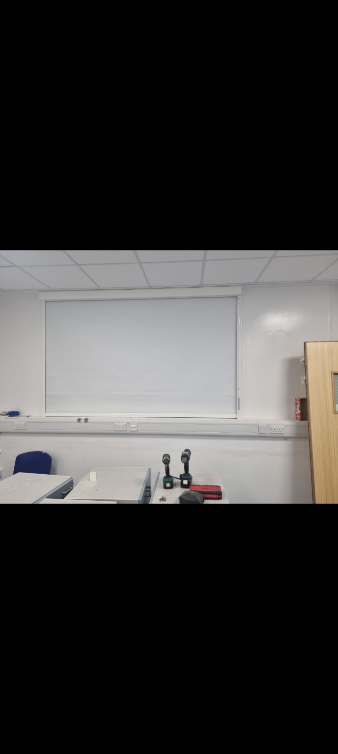 Roller blind fitted in a working room