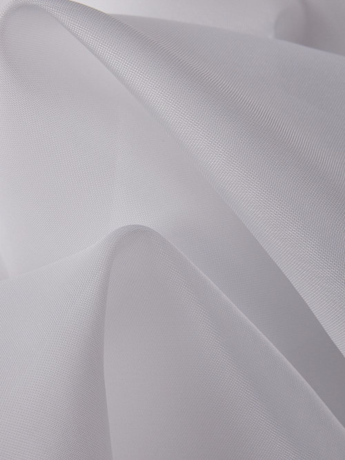 Close view of plain pale voile fabric