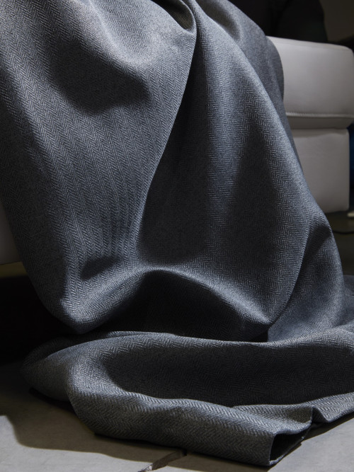 Close view of dark textured curtain fabric